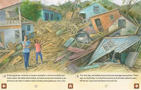 Two people looking at damage caused by the hurricane.